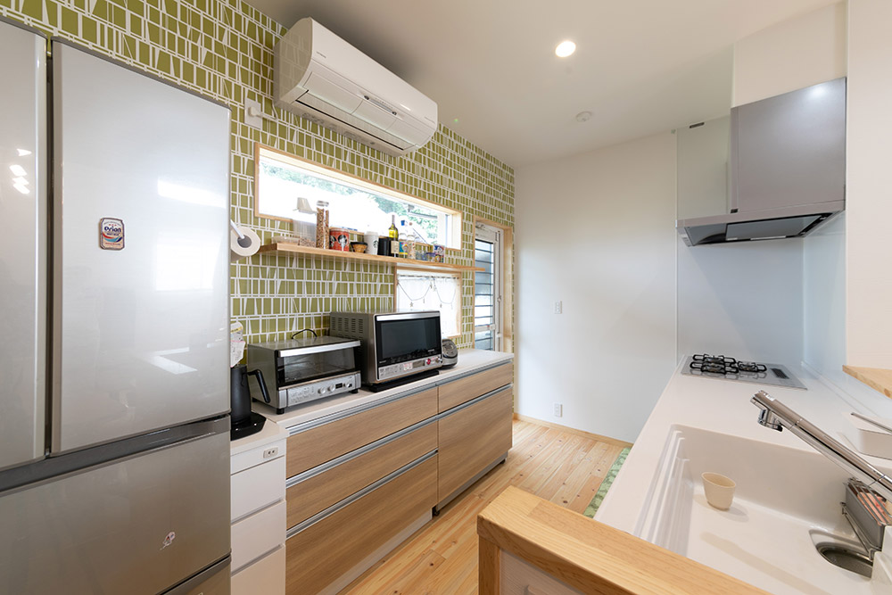 アクセントクロスでおしゃれに家事を楽しむキッチンへ